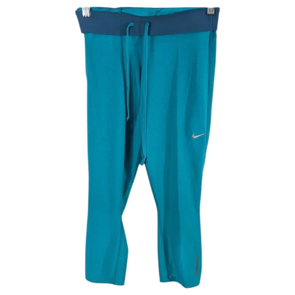 Nike Leggings Womens Small Aqua Drawstring Zip Pocket Yoga Capri Triangle Dots